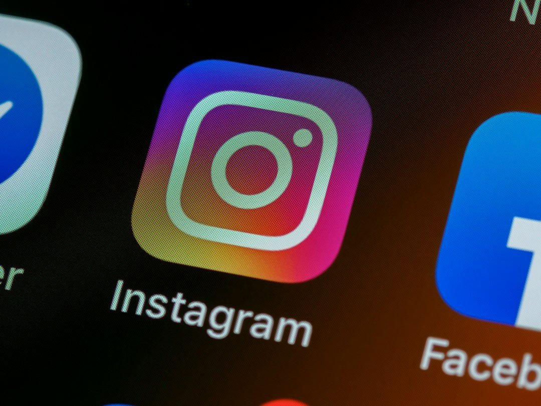 Instagram icon on smartphone showing social content marketing